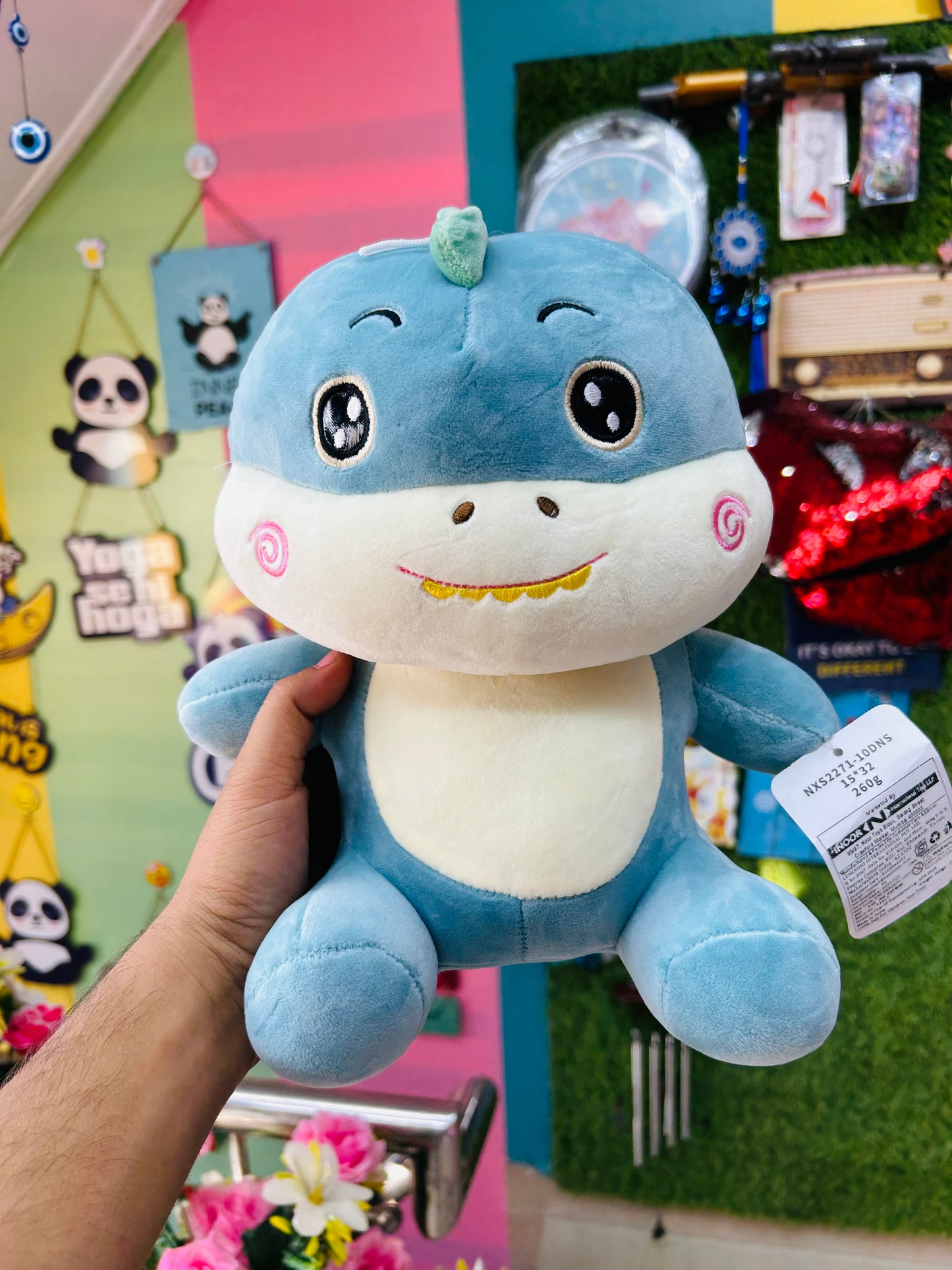 Bubbly dino buddy- the blue smiling dinosaur playful and friendly