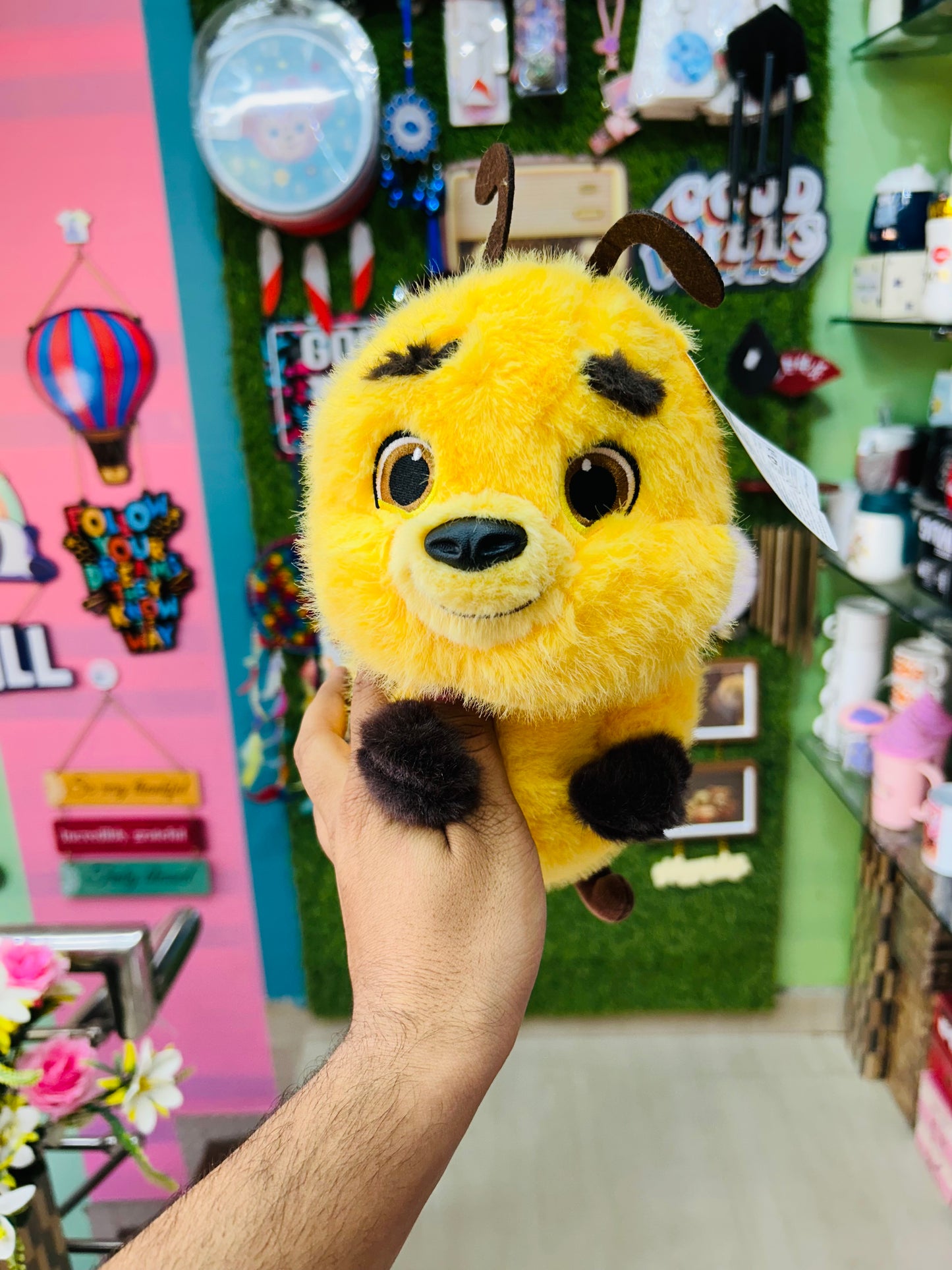 Fun yellow plush toy - with horns