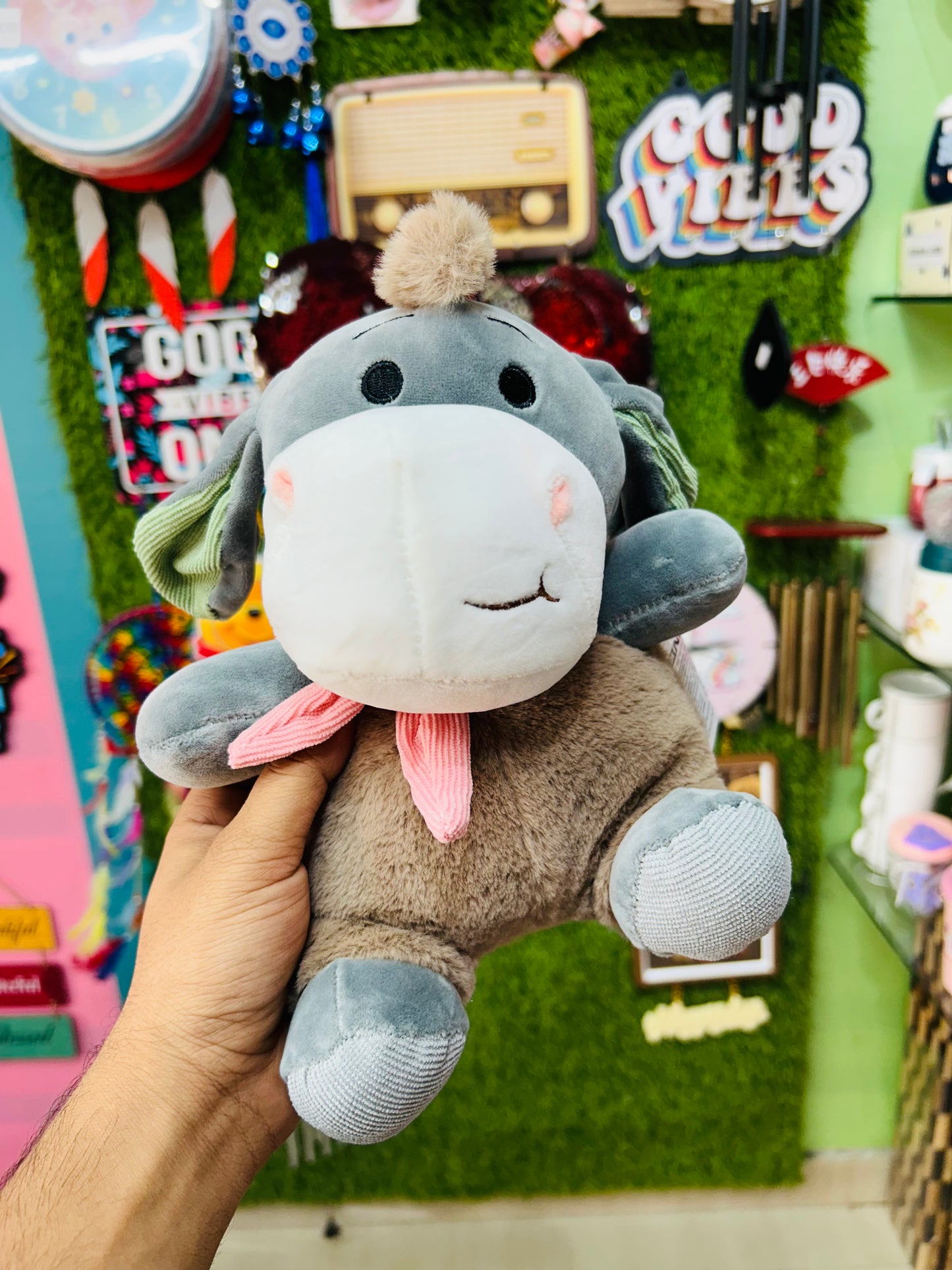 Cheerful donkey with blush scraf